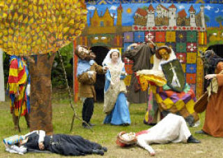 A troupe of actors recreates a 14th-century play at Camlann Medieval Village