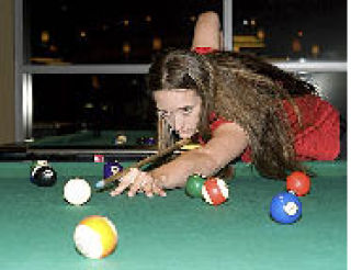 Pool Vixen Jessica Orth takes her shot at defending the Gauntlet in the battle of the sexes pool tournament at The Parlor  Billiards & Spirits.