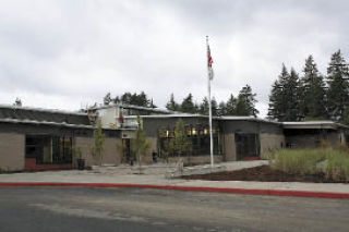 Workers put the final touches on the Sherwood Forest Elementary School.