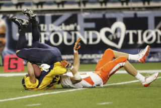 Bellevue’s Freddie Levine scores a touchdown during the Wolverines’ 34-27 win over California High School on Sept. 20 at Qwest Field. The matchup was part of the annual Best of the West Football Classic