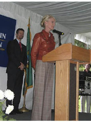 Cindy McCain speaks to guests at the Hunts Point fundraiser. Behind her is Todd Palin.