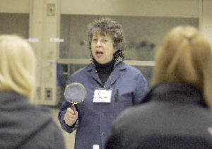 Forensic scientist Geraldeen Chavez talks to a group of high school students during the Expanding Your Horizons science and math workshop at BCC on Tuesday