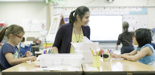 VIBES volunteer Shikha Khandelwal works with students at Stevenson Elementary School.
