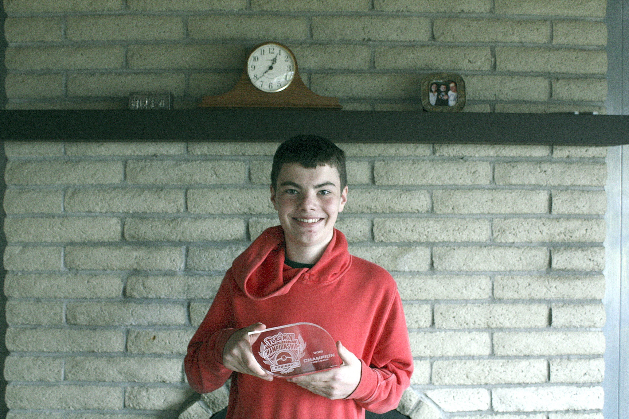 Aaron Nolan shows off his Regional Pokémon trophy that helped him on his way to the National Pokémon tournament in August. Ryan Murray/staff photo