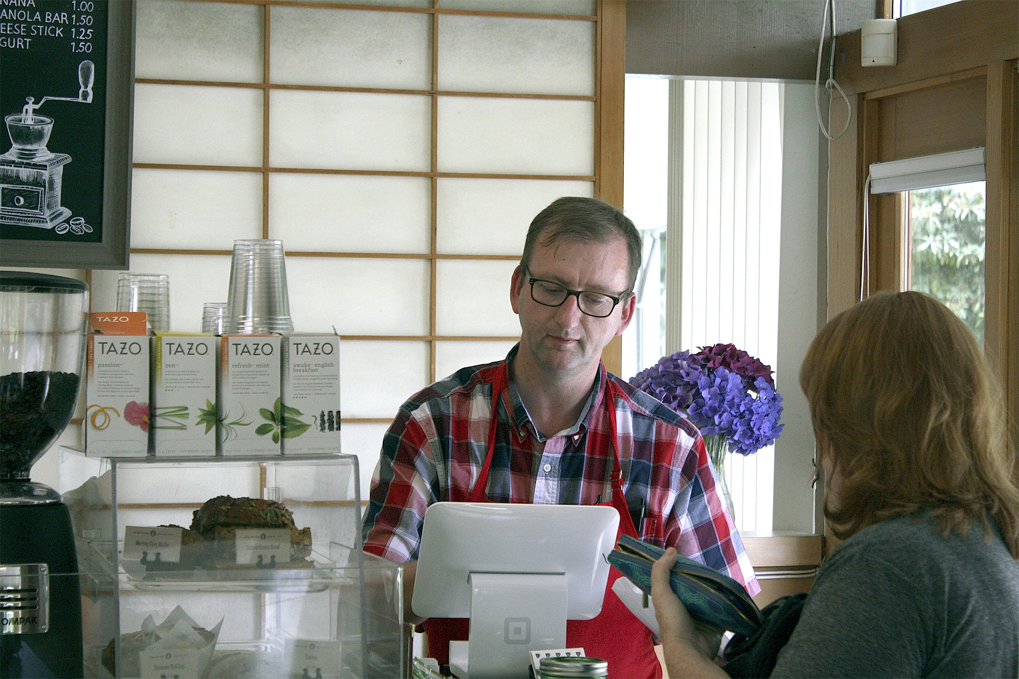 Tony Frizelle mans the register at Copper Kettle Coffee