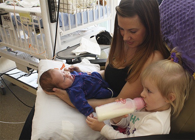 Andrea Hall with baby Kennedy and older daughter