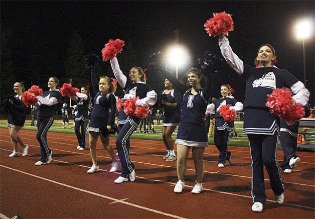 Interlake Saints cheerleaders and sparkle cheer team members pep up the crowd during an Oct. 28 game.