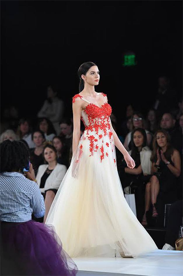A model wears a gown designed by Phuong Minh Nguyen