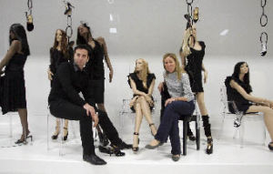 Report’s Assaf Ziv and Stacy Cail pose among the mannequins and shoes on display inside the company’s facility.