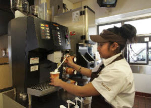McCafe barista Yanet Basto makes an espresso drink at the McDonald’s in the Eastgate area on Wednesday