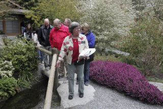 Bellevue Botanical Garden docent Lucia Kelley leads a tour Saturday
