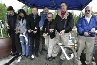 At the new Crossroads Water Spray Playground ribbon cutting were: from left