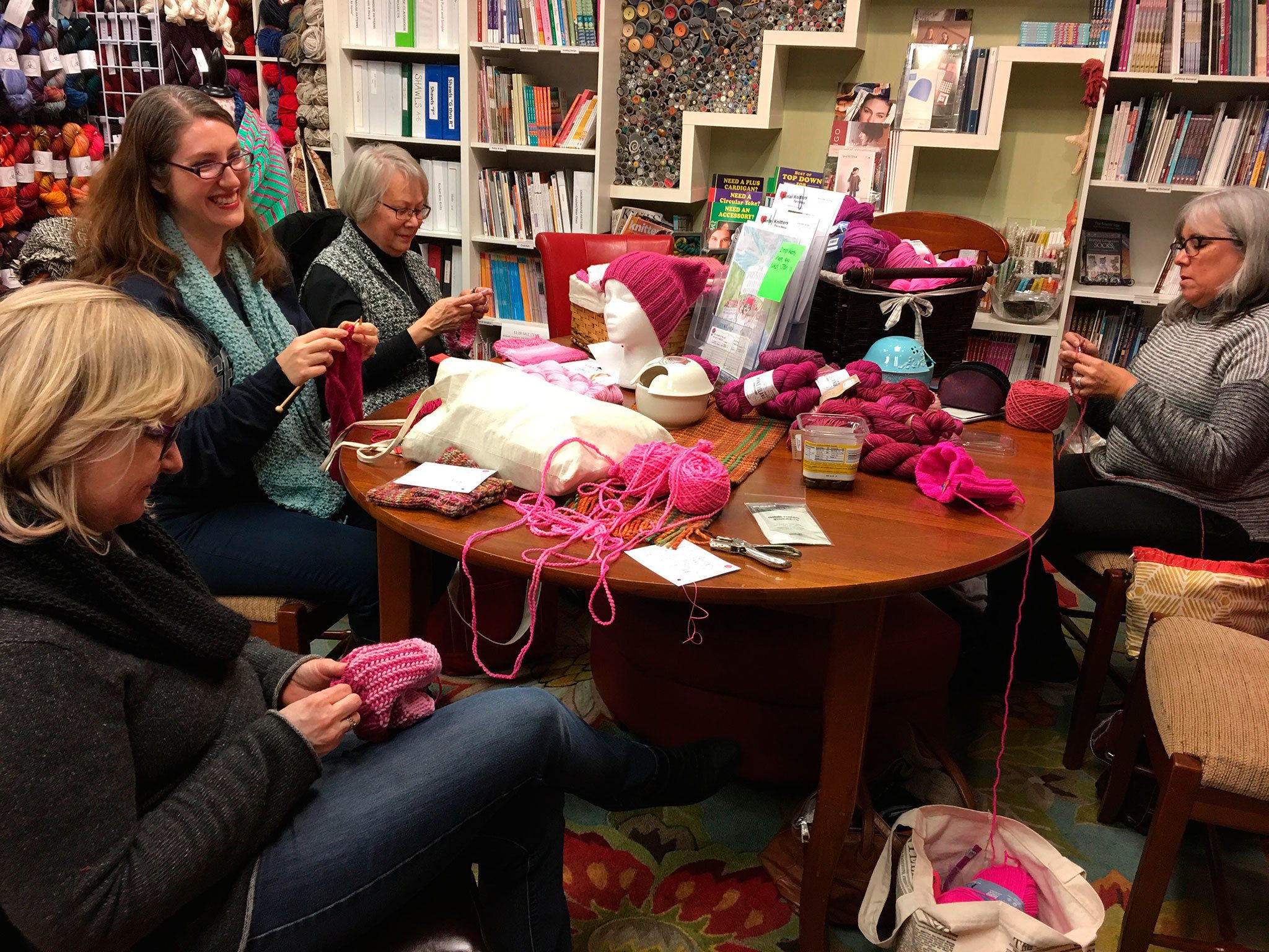 Courtesy photo                                Debie Frable, Jennifer Cail, Susanna Gilbert and Sabrina Barton participate in a Pussyhat Project event at Serial Knitters in Kirkland.