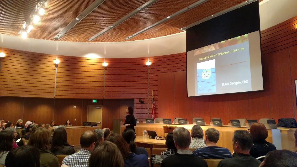 Educator asks city hall crowd “what does it mean to be white?” in MLK Day event