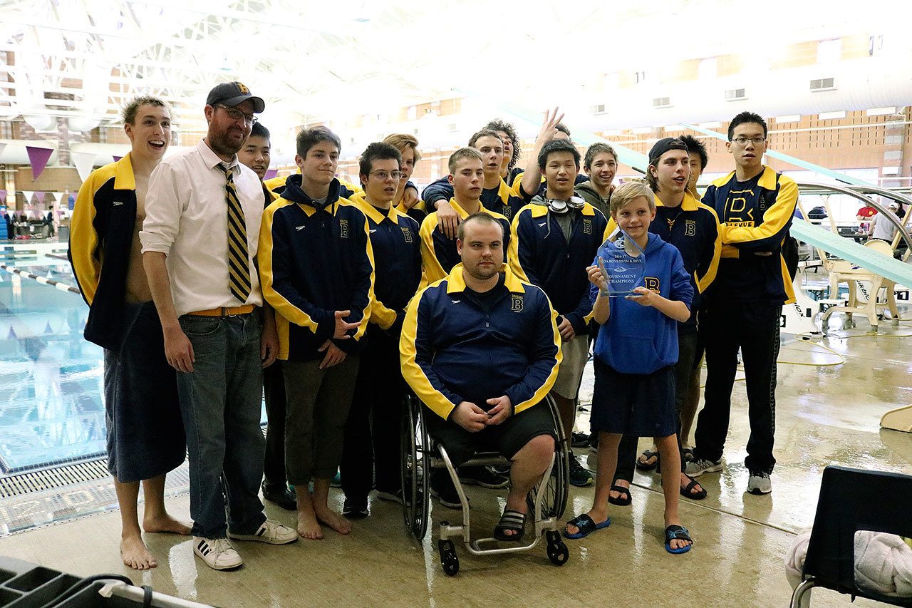 The Bellevue boys swim and dive team poses with its KingCo trophy (Joe Livarchik/staff photo).