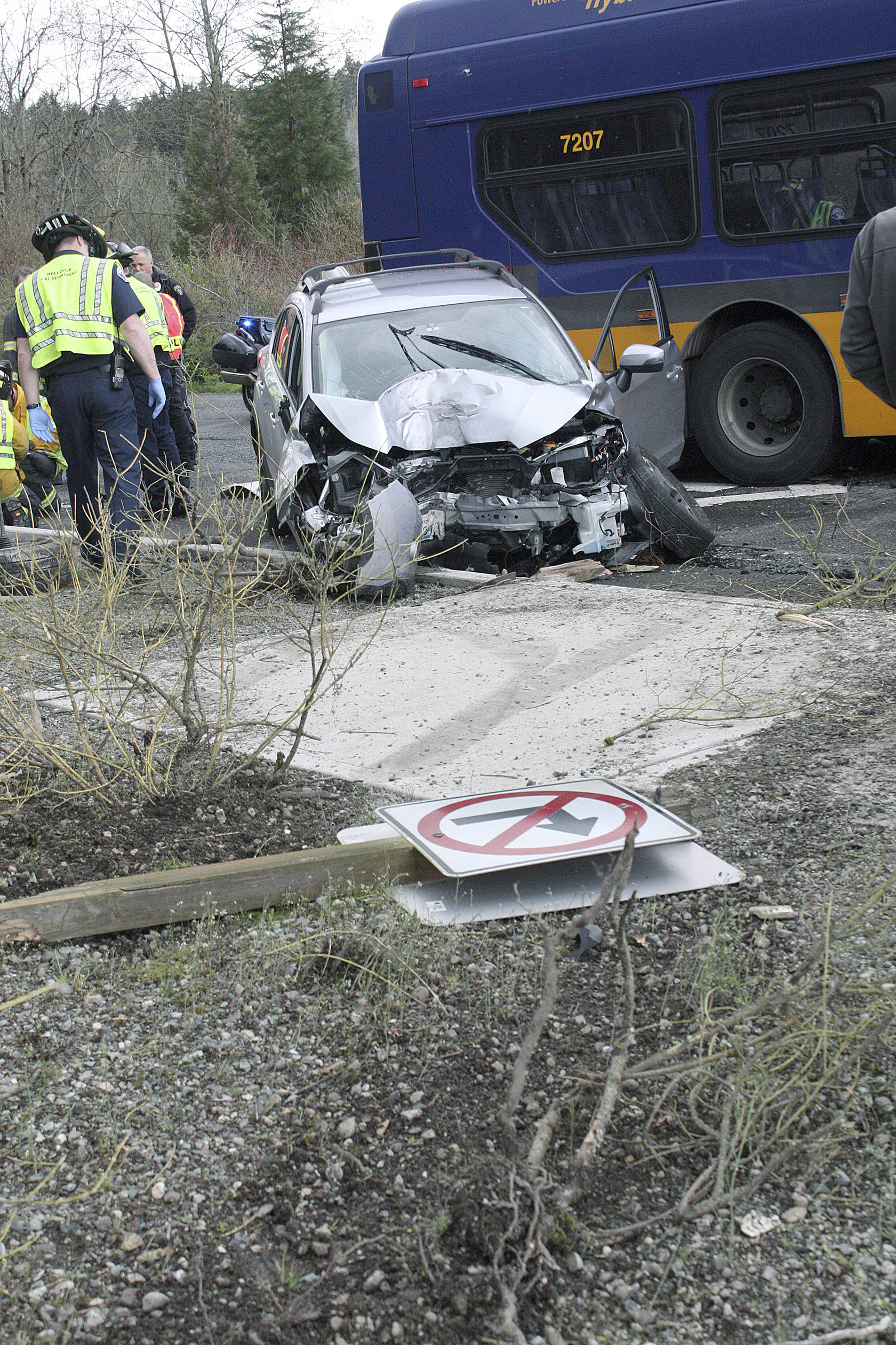 The aftermath of a car crash Thursday afternoon. The driver of the silver vehicle cross a lane of traffic and struck a King County Metro bus stopped at a light. Ryan Murray/staff photo