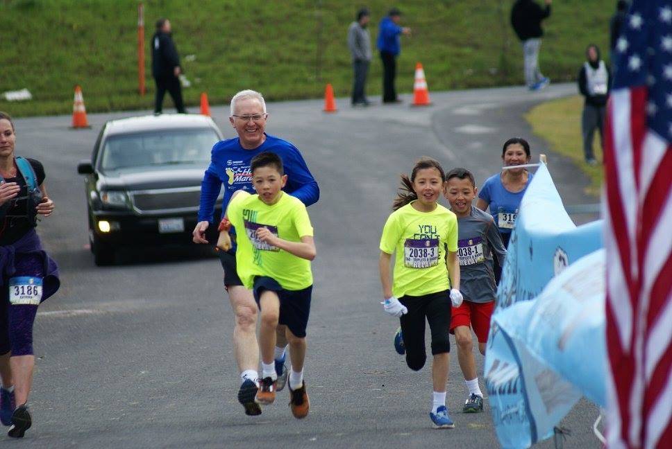 Bellevue running family blooms at Woodland marathon