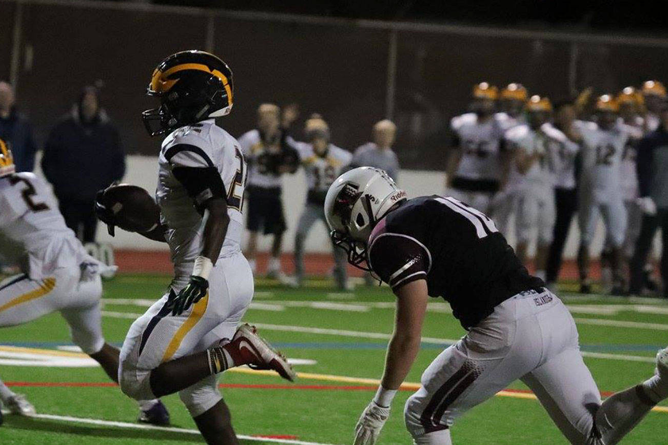 Photo courtesy of Don Borin/Stop Action Photography                                Bellevue Wolverines senior running back Isaiah Ifanse had five rushing touchdowns against the Mercer Island Islanders on Oct. 13. Bellevue defeated Mercer Island 40-7.
