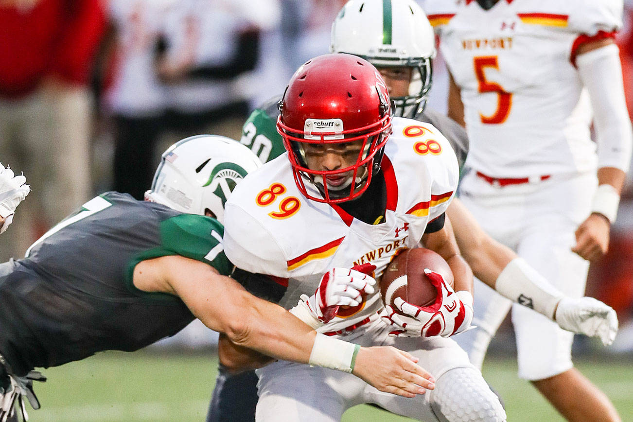 Photo courtesy of Rick Edelman/Rick Edelman Photography                                Newport Knights senior Marcus Fukutomi makes a move upfield after making a catch against the Skyline Spartans in a Class 4A KingCo contest on Sept. 8.