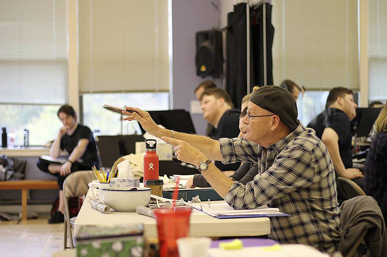 Photo courtesy of Village Theatre                                Director Steve Tomkins guides the Newsies at rehearsal two weeks before opening night.
