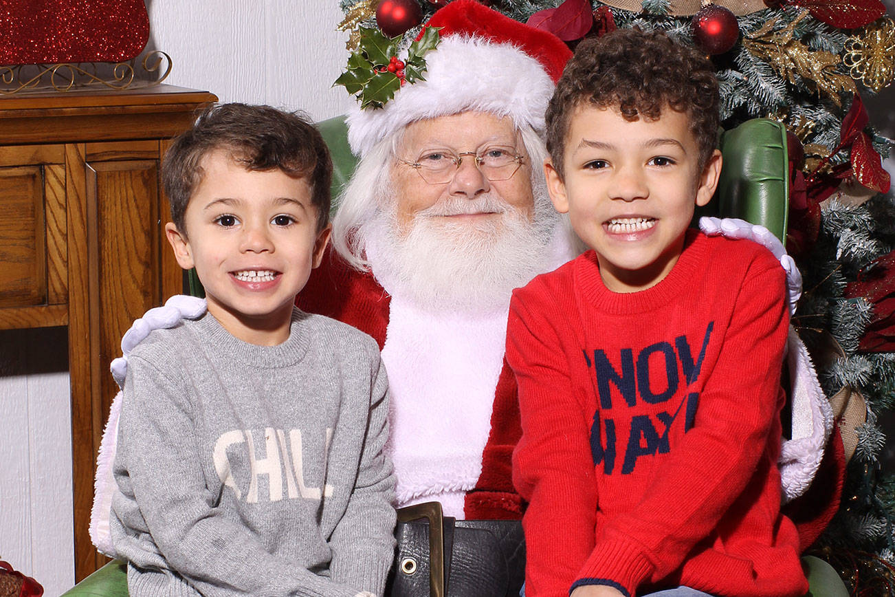 First Santa photography business continues to capture his magic within the community