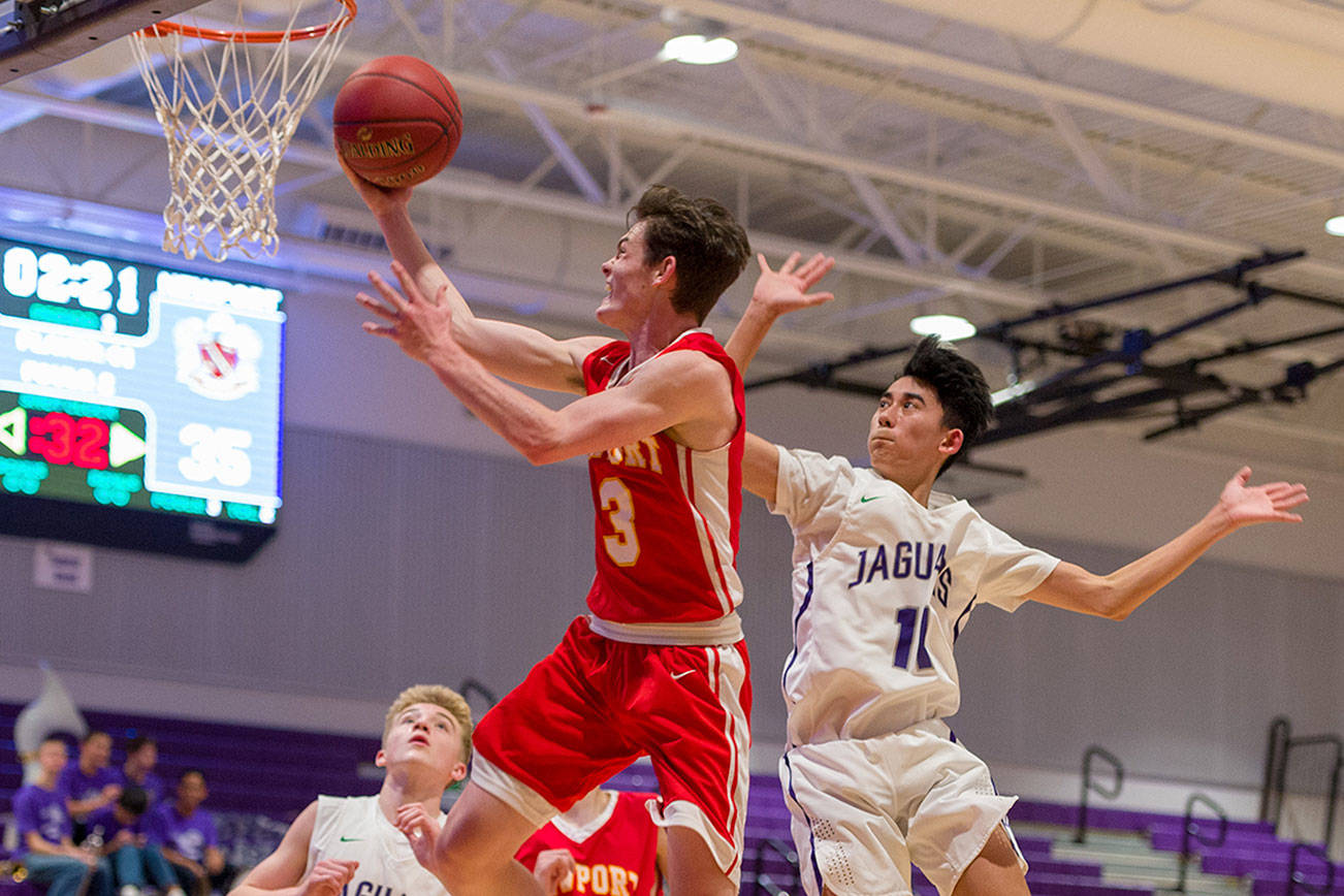 Photo courtesy of Patrick Krohn                                The Newport Knights earned a 60-54 win against the North Creek Jaguars on Dec. 12. Newport guard Elliot Thompson (pictured) drives to the hoop against North Creek. The Knights improved their overall record to 4-1 with the victory.