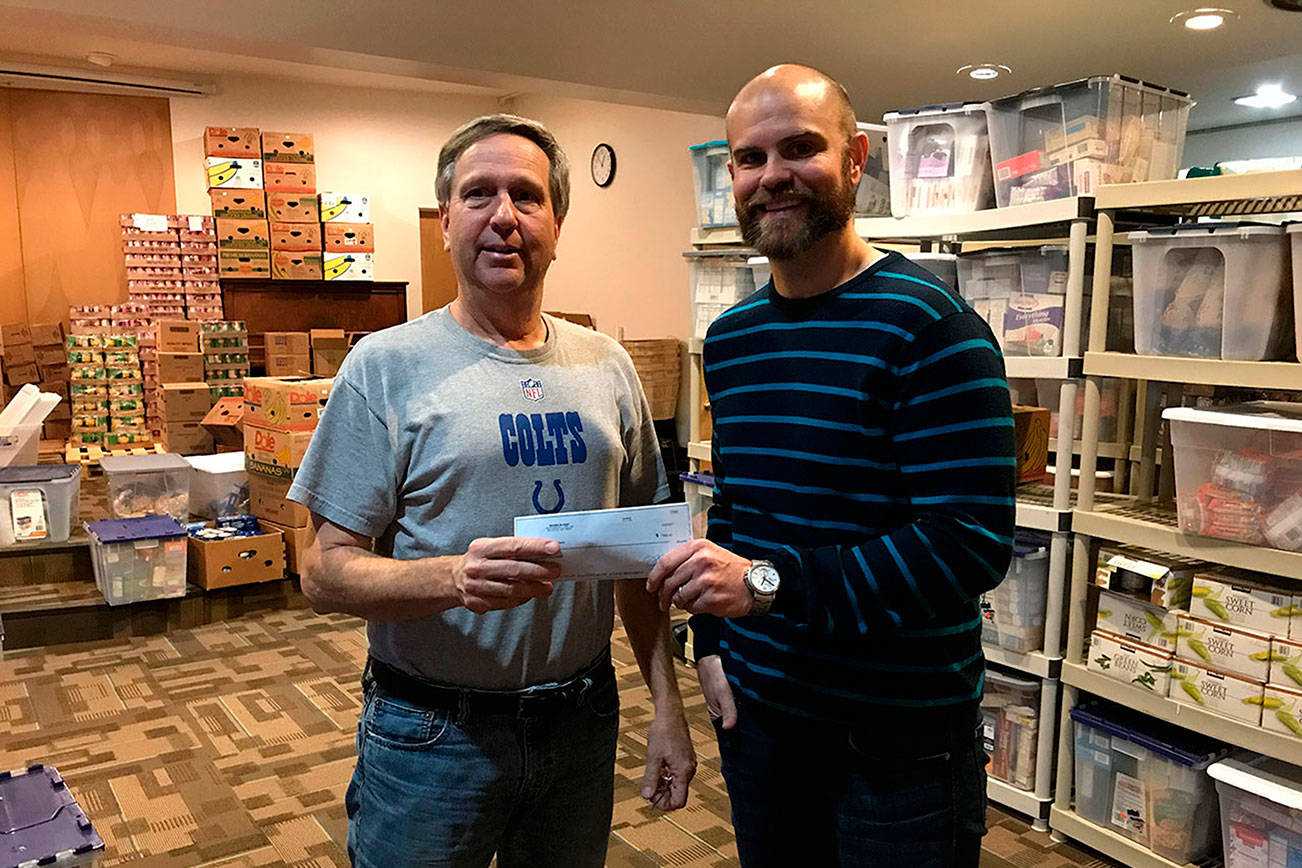 Bellevue business donates $1,000 to Renewal Food Bank
