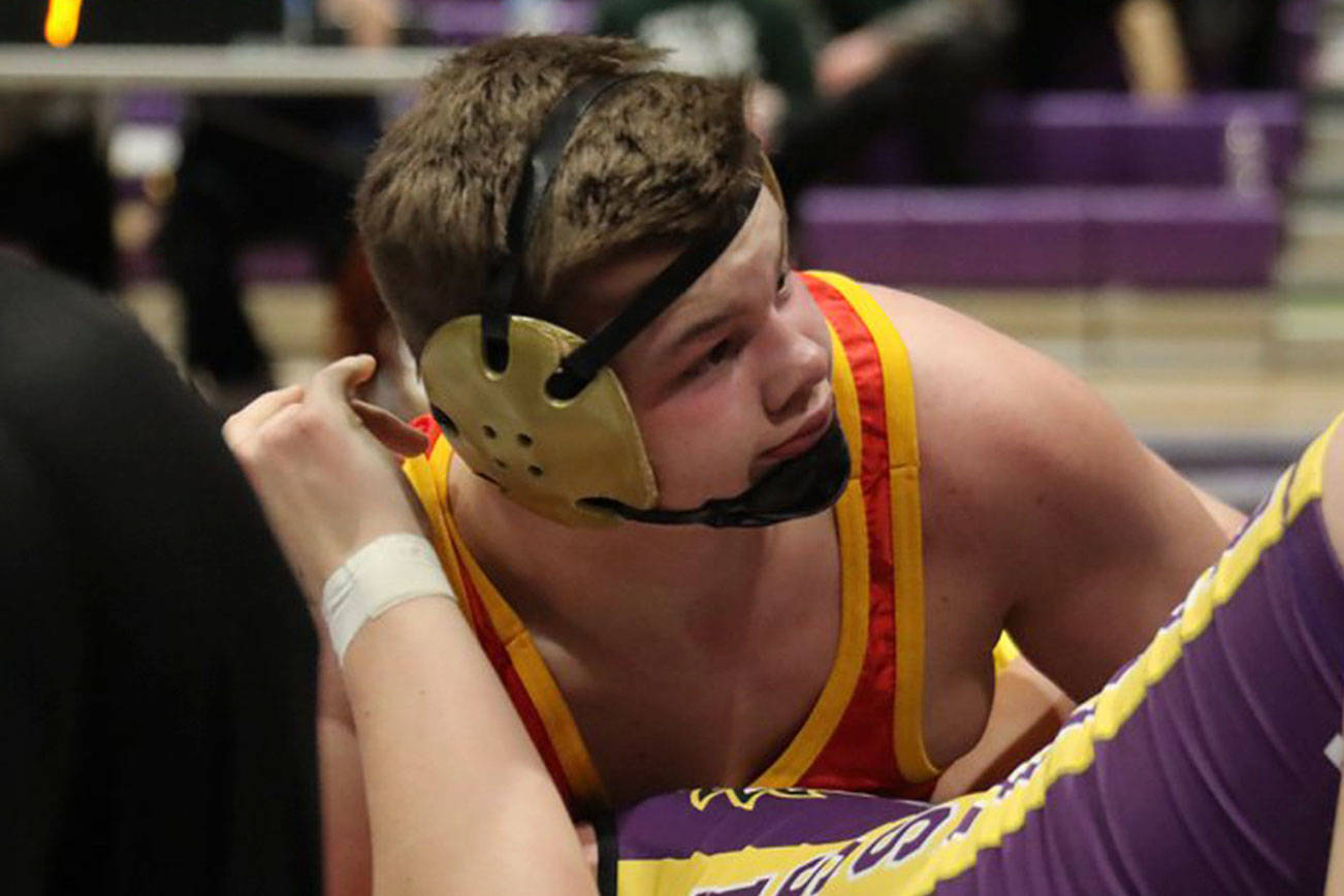 Photo courtesy of Don Borin/Stop Action Photography                                Newport Knights senior wrestler Charlie Baumann pinned Issaquah’s Brandon Lee in the Class 4A KingCo 285-pound championship match on Feb. 3 at North Creek High School.