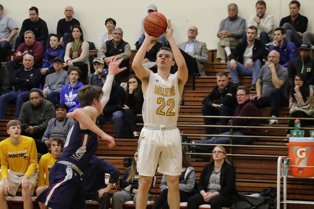 Photo courtesy of Don Borin/Stop Action Photography                                Bellevue Wolverines senior forward Andrew Kenny unleashes a three-point attempt against the Juanita Rebels in the KingCo 3A title game on Feb. 7 at Newport High School in Factoria.