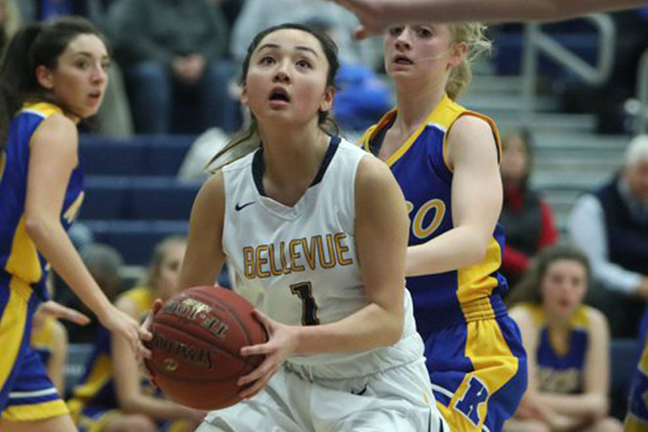 Photo courtesy of Don Borin/Stop Action Photography                                With a berth in the Class 3A state girls basketball tournament on the line, the Bellevue Wolverines delivered against the Kelso Hilanders. The Wolverines earned a 50-33 win against the Hilanders in a winner-to-state, loser-out regional playoff game on Feb. 23 at Bellevue College. Bellevue sophomore guard Kara Choi (pictured) drove to the basket against the interior of the Kelso defense. The Wolverines (21-5) will face the Bethel Braves at 9 a.m. on Feb. 28 in the first round of the Class 3A state tournament at the Tacoma Dome.