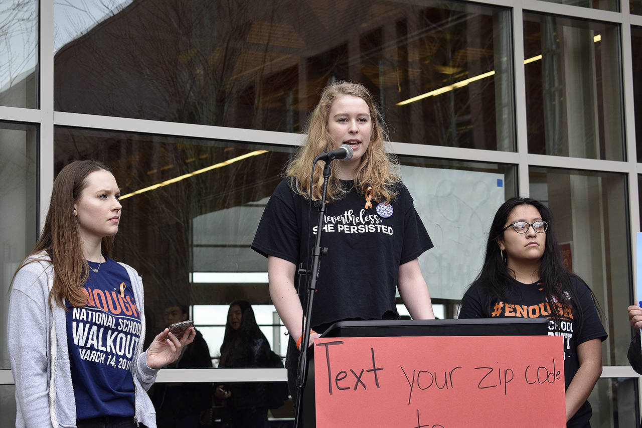 Bridget Conroy, a Bellevue High School junior, speaks at Bellevue High School’s National School Walkout on March 14. Raechel Dawson/staff photo
