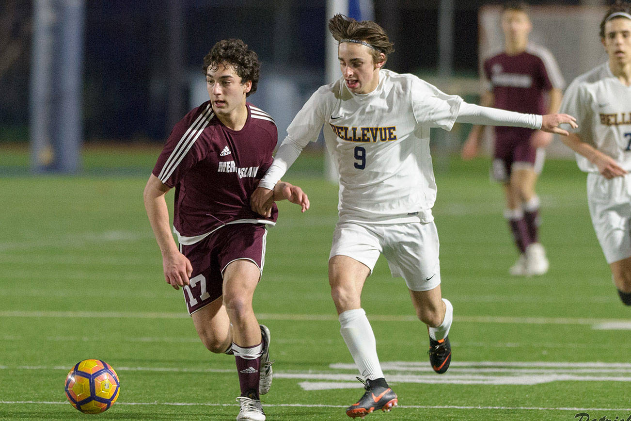 Photo courtesy of Patrick Krohn/Patrick Krohn Photography                                Bellevue sophomore Jed Michael, right, and Mercer Island midfielder Luca Mtskhetadze, left, battle for possession of the ball. Bellevue and Mercer Island battled to a 0-0 tie on March 23 in Bellevue.
