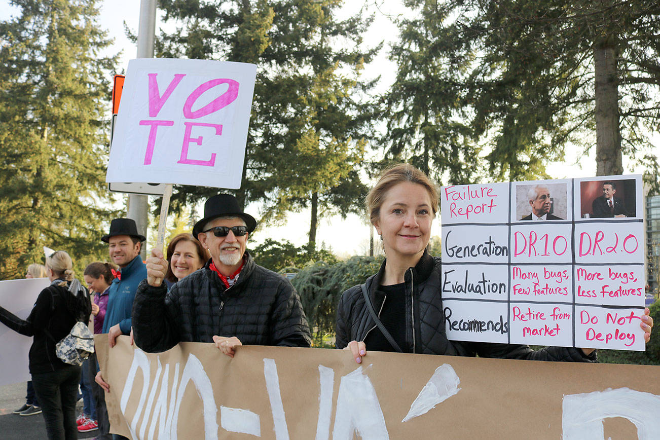 Local activist groups hold rally outside Dino Rossi fundraiser