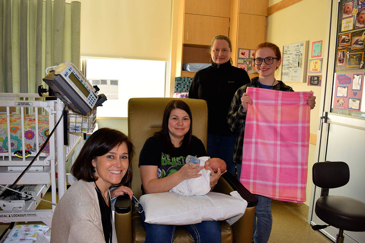 Overlake nurse Michele McRae, Katherine Rogers (mom), Alice Rogers (baby), Elisabeth Hall and Emma Hall. Photo courtesy of Overlake Medical Center