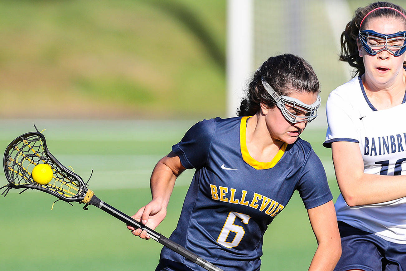 Photo courtesy of Rick Edelman/Rick Edelman Photography                                The Bainbridge Island Spartans defeated the Bellevue Wolverines 18-4 in the Washington Schoolgirls Lacrosse Association (WSLA) state semifinals on May 15 at Starfire Sports Complex in Tukwila.                                Bellevue finished the 2018 season with an overall record of 12-3. Bellevue player Vanessa Rubel, left, carried the ball down the field against Bainbridge Island in the season finale.