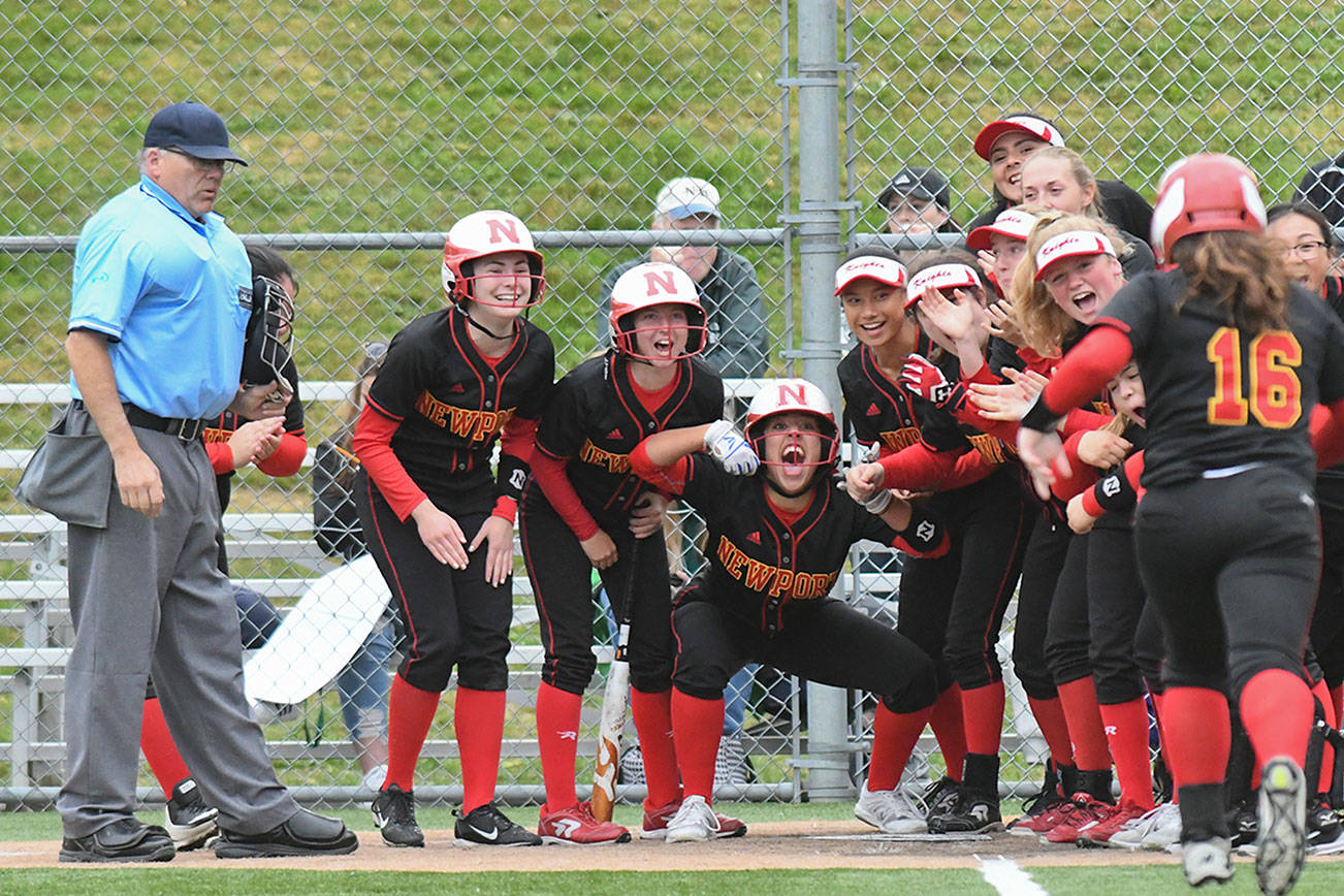 Photo courtesy of Dale Garvey                                Newport players mob Ariana Arnone at the plate after she connected on two-run home-run in the top of the second inning against the Woodinville Falcons in a winner-to-state, loser-out district playoff game on May 17 in Kenmore. Newport defeated Woodinville 9-1 in the contest.