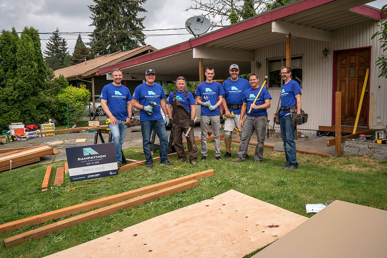 Volunteers build access ramps for locals