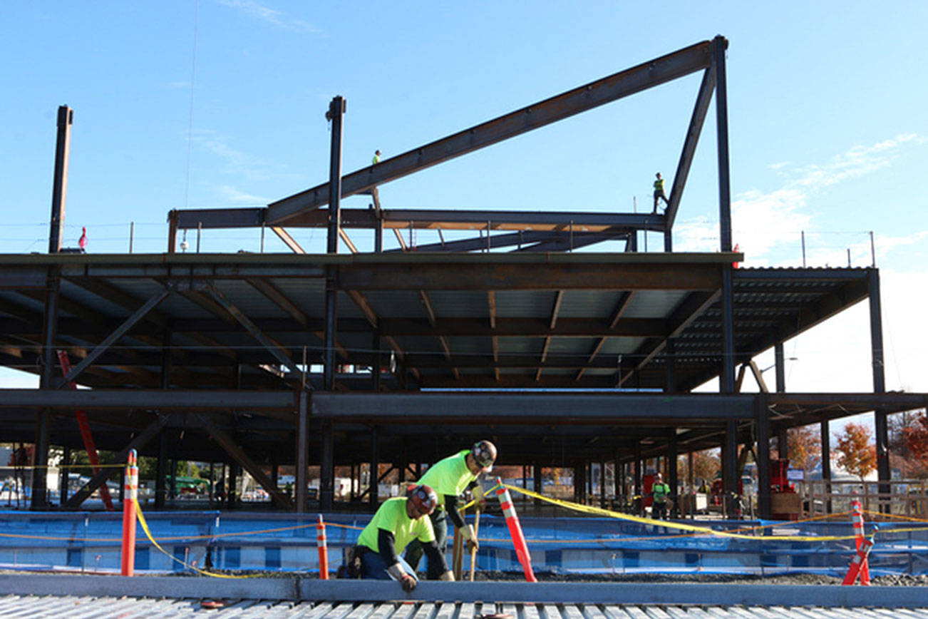 The Erection Company does the steel work on the GIX school for Lease Crutcher Lewis as part of the major construction of Wright Runstad & Company’s Spring District project in Bellevue, Wash. Photo by Marcus R. Donner