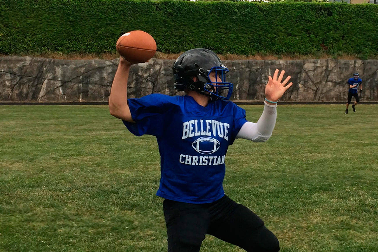 Bellevue Christian Vikings senior quarterback Mick Larsen (pictured) will be in his third season as the starting signal caller on the gridiron this fall. Shaun Scott/staff photo