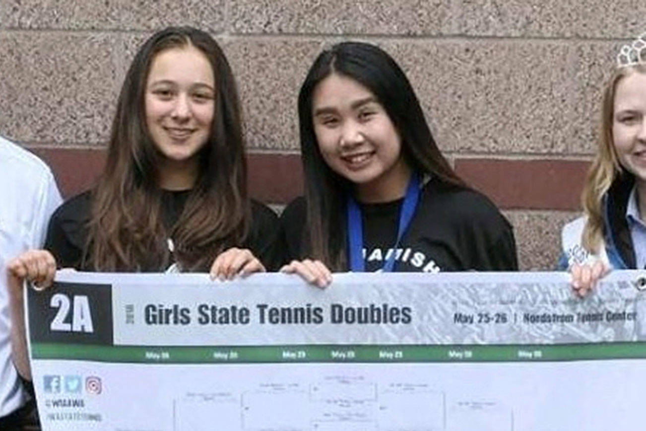 The Sammamish Totems girls tennis doubles team consisting of sophomores Nina Vongsaly and Katrina Kuntz captured the Class 2A state title on May 26 at the Nordstrom Tennis Center. The duo of Vongsaly/Kuntz defeated Sequim’s doubles squad of Kalli Wiker/Jessica Dietzman 2-0 (6-3, 6-3) in the championship match.                                Photo courtesy of Wesley Newton