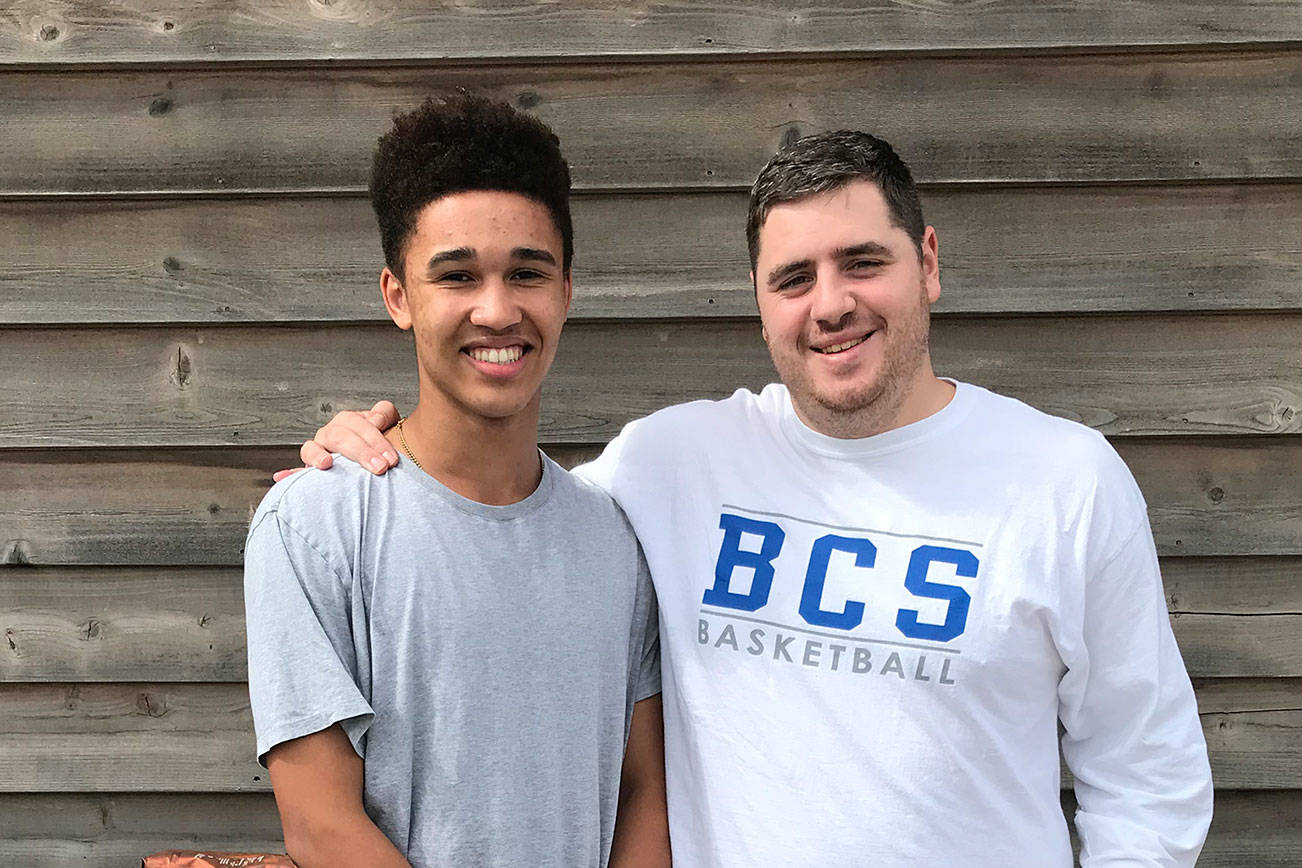 Bellevue Christian Vikings senior guard Andy Moyer, left, and Vikings head coach Brandon Kats, right, hope to lead the Vikings to the Class 1A state tournament for the second year in a row during the 2018-19 season.                                Shaun Scott, staff photo