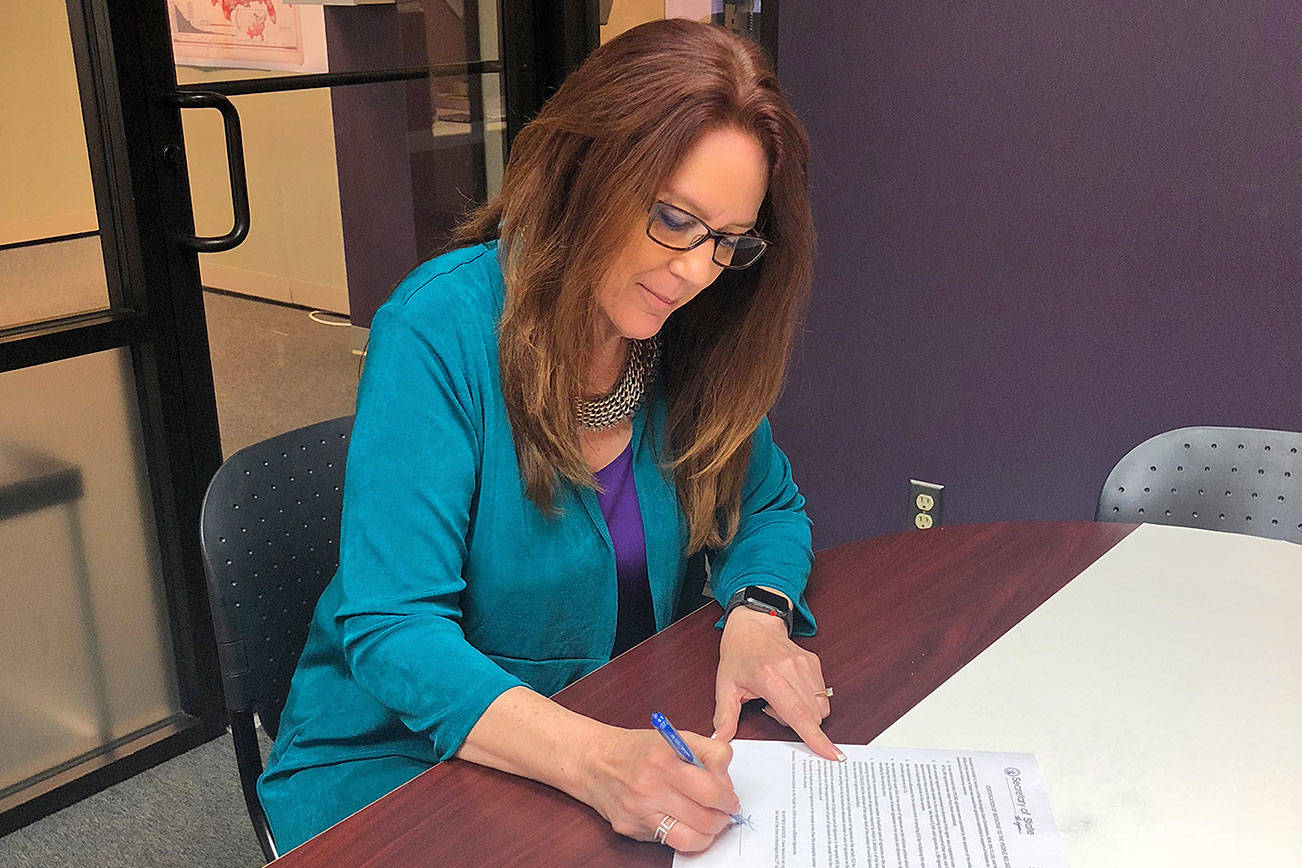 Secretary of State Kim Wyman certifies Initiative 1639’s qualifications for the November General Election. Shortly afterwards, she was sued by the National Rifle Association and Second Amendment Foundation. Courtesy of the Secretary of State