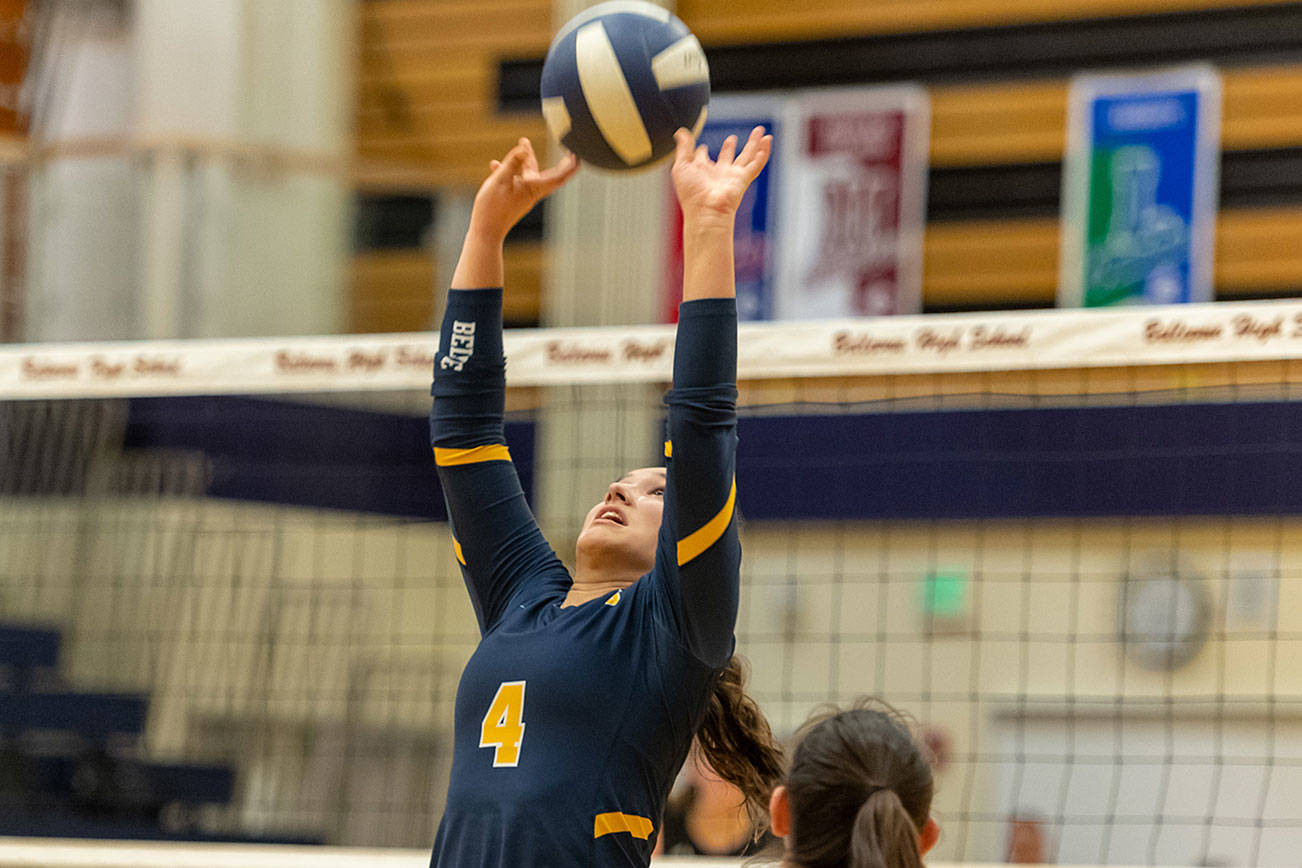 Bellevue Wolverines junior setter Meghan Weber sets up an opportunity for one of her teammates to score a point against the Mercer Island Islanders in a rivalry matchup on Oct. 2. Bellevue earned a comeback 3-2 victory against Mercer Island. Photo courtesy of Patrick Krohn/Patrick Krohn Photography