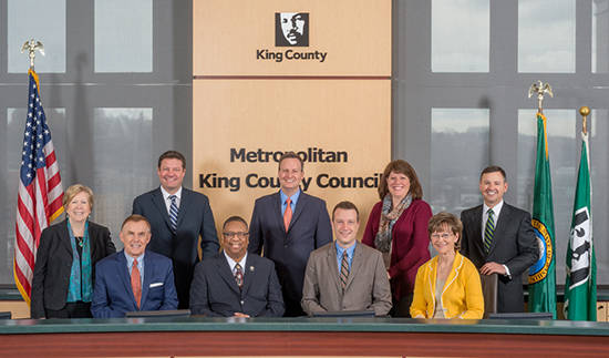 King County Council, from left to right: Jeanne Kohl-Welles, Pete von Reichbauer, Reagan Dunn, Larry Gossett, Dave Upthegrove, Council Chair Joe McDermott, Council Vice Chair Claudia Balducci, Council Vice Chair Kathy Lambert, and Rod Dembowski. Photo courtesy of King County
