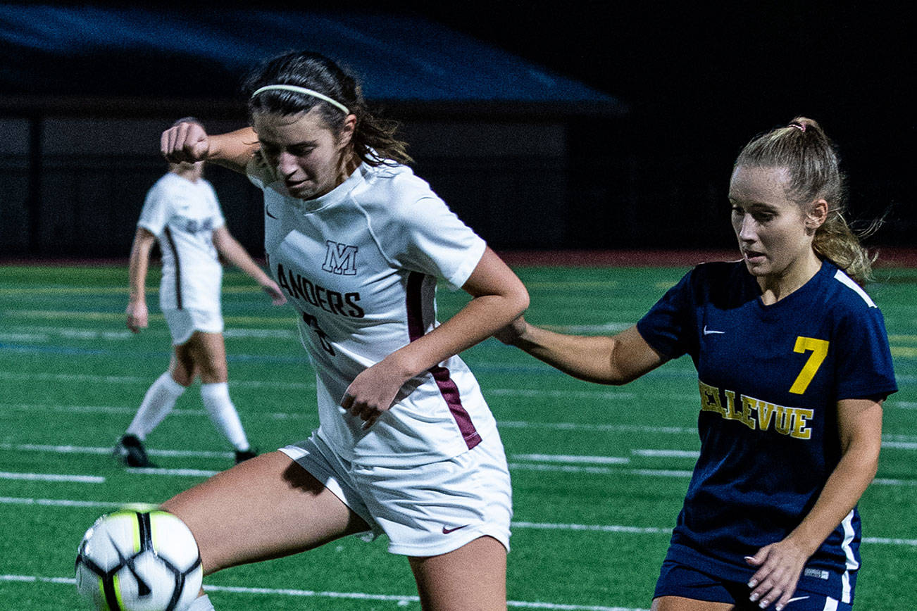 The Mercer Island Islanders girls soccer team earned a 1-0 win against the Bellevue Wolverines in the regular season finale for both teams on Oct. 25. Bellevue finished the 2018 regular season with an overall record of 6-7-2. Bellevue senior Izzy Buck, right, tries to take the ball away from a Mercer Island player Abby Berman. Photo courtesy of Stephanie Ault Justus
