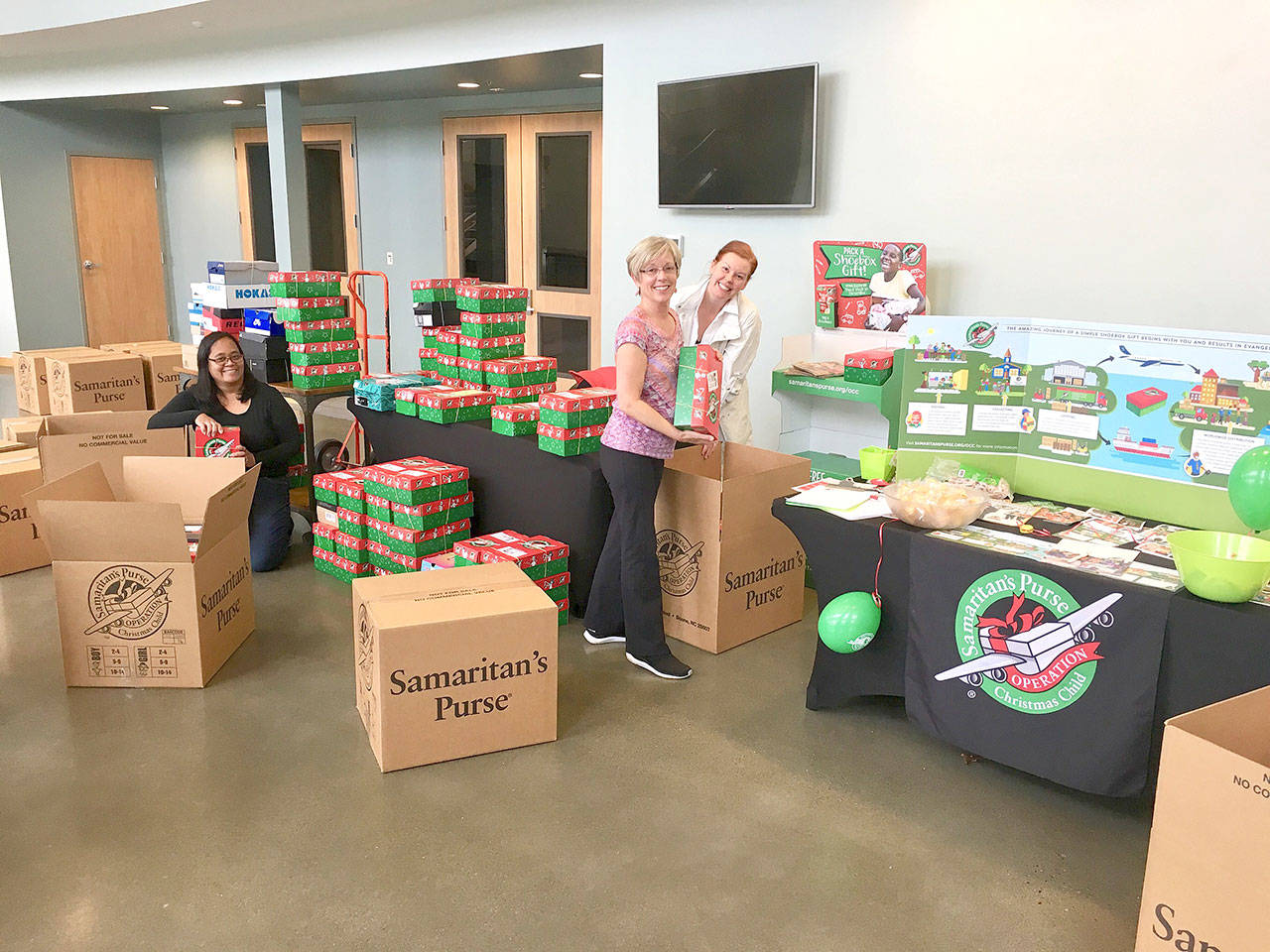 Volunteers at Calvary Chapel Eastside organizing 400 shoeboxes that were dropped off in one day. Courtesy of Melissa Saunders.