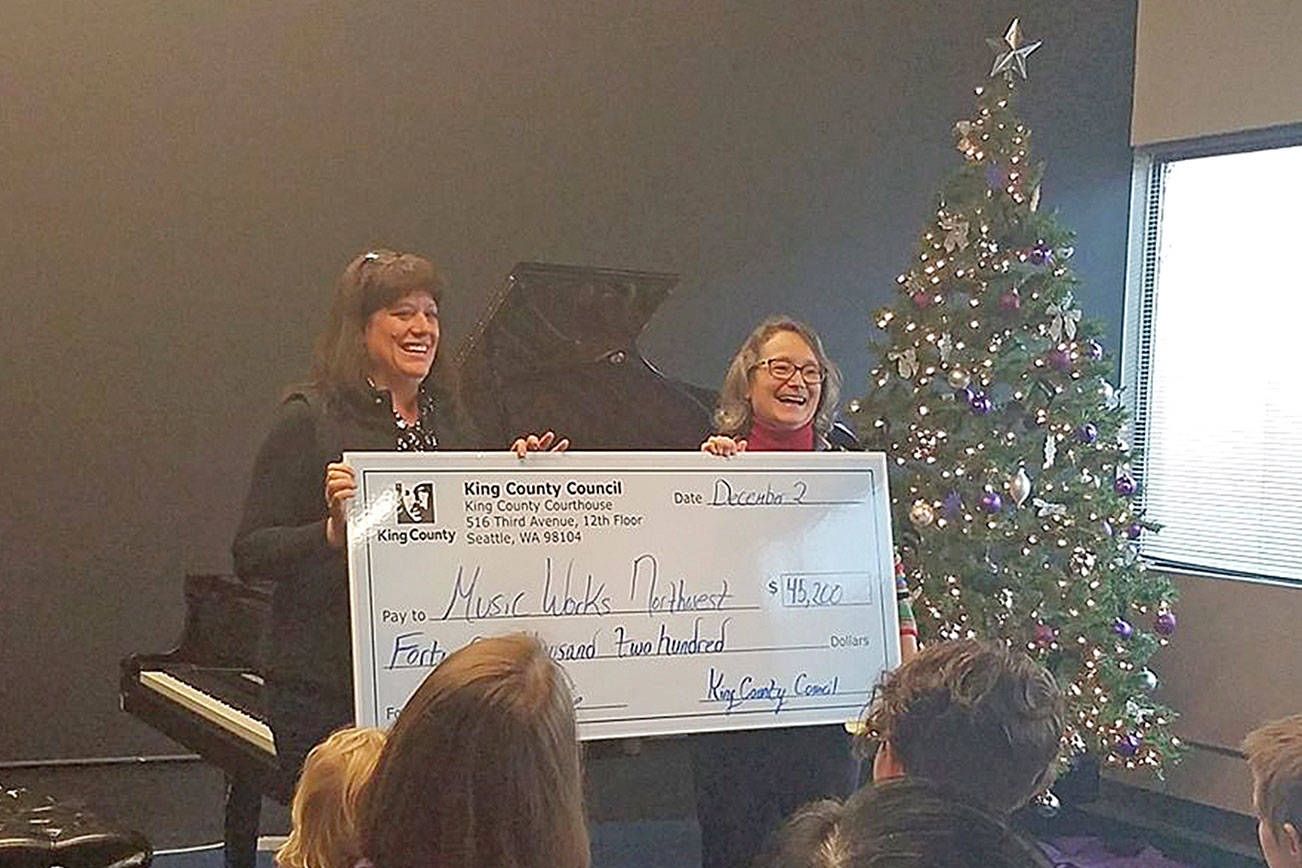 King County Council Vice Chair Claudia Balducci presented Music Works Northwest, a $45,200 check on Dec. 2. Photo courtesy of King County