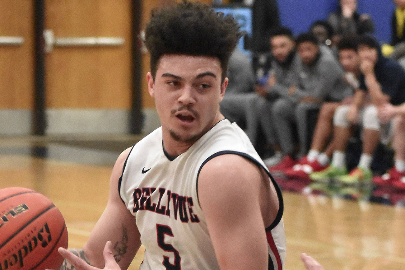 Bellevue Bulldogs men’s basketball player Curtis Walker drives to the basket in a game earlier this season. Walker is averaging 13 rebounds per game through eight games. Photo courtesy of Kwame Kang