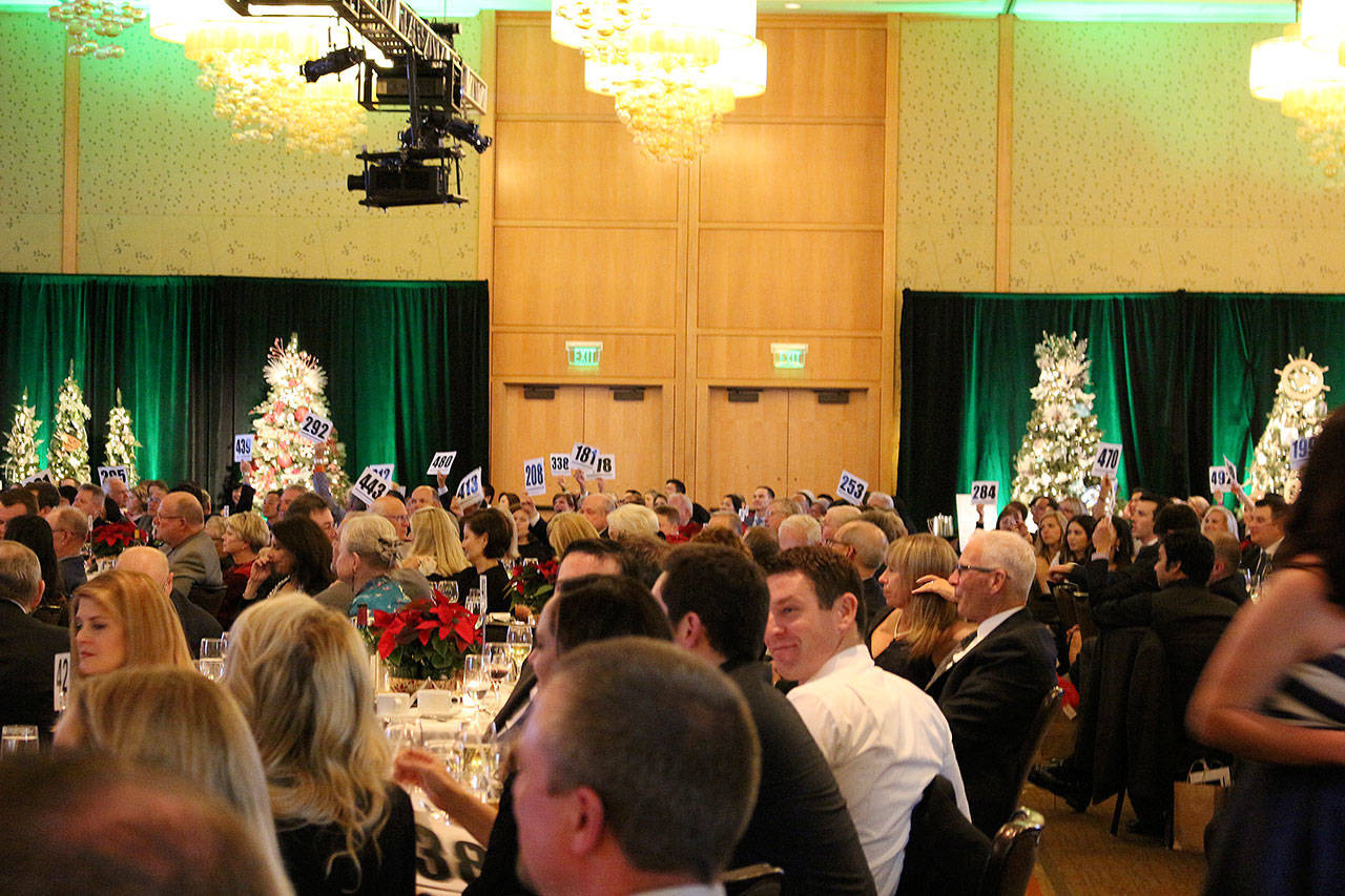 Jubilee REACH’s live auction at the Festival of Trees holiday gala on Nov. 10. Madison Miller/staff photo.