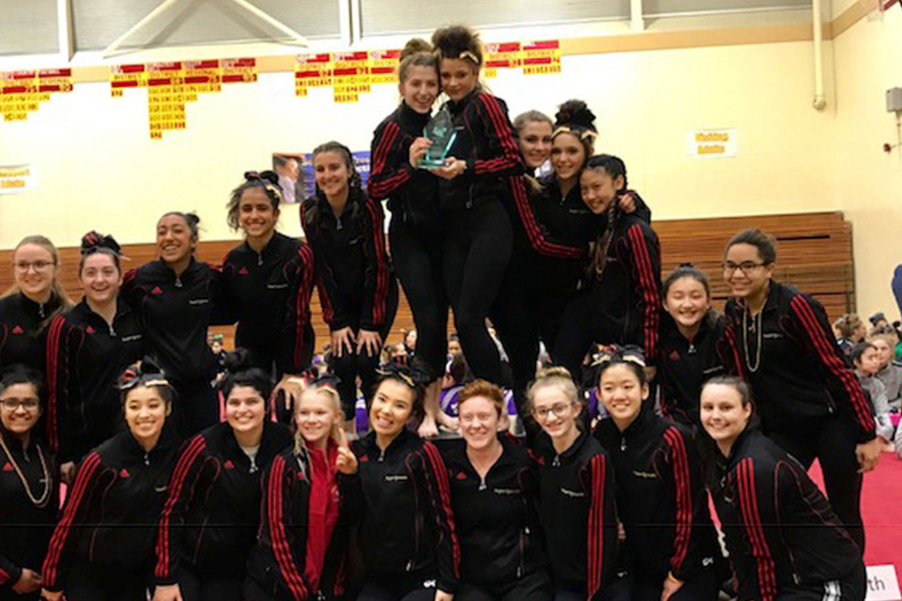 The Newport Knights girls gymnastics team won a district championship on Feb. 15 in Factoria. The Knights, who tallied 175.350 team points, edged out second-place Woodinville (173.300) by just 2.05 points. Photo courtesy of Stacy Nemcher-Rendon